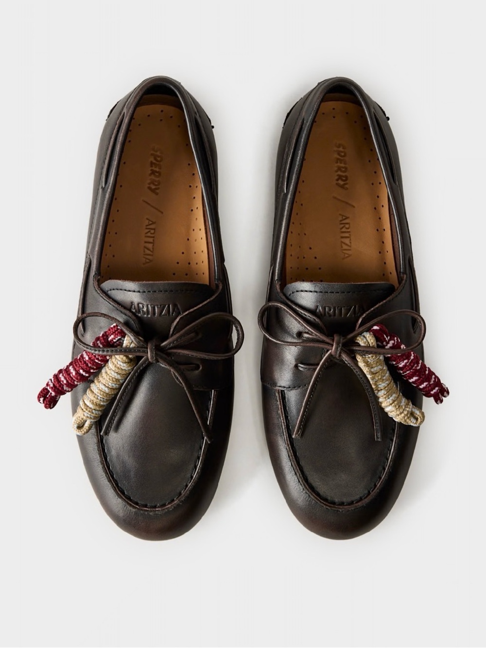 Women Aritzia Dark Brown Leather Boat Shoes with Red and Cream Tassel Accents